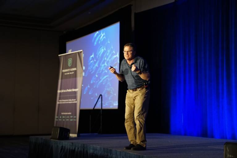 Man on Stage Giving Speech